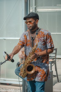 a man playing a saxophone